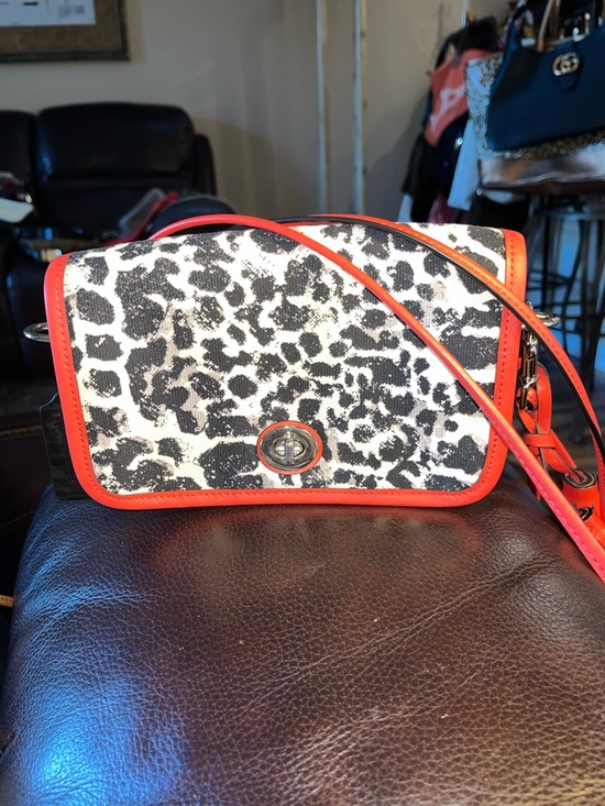 Coach Handbags - EUC Authentic Coach Ocelot Print Penny Crossbody